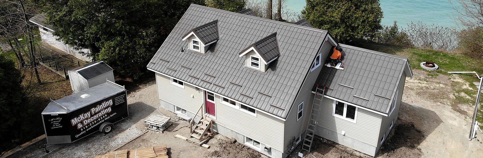 Aerial cottage with grey roof